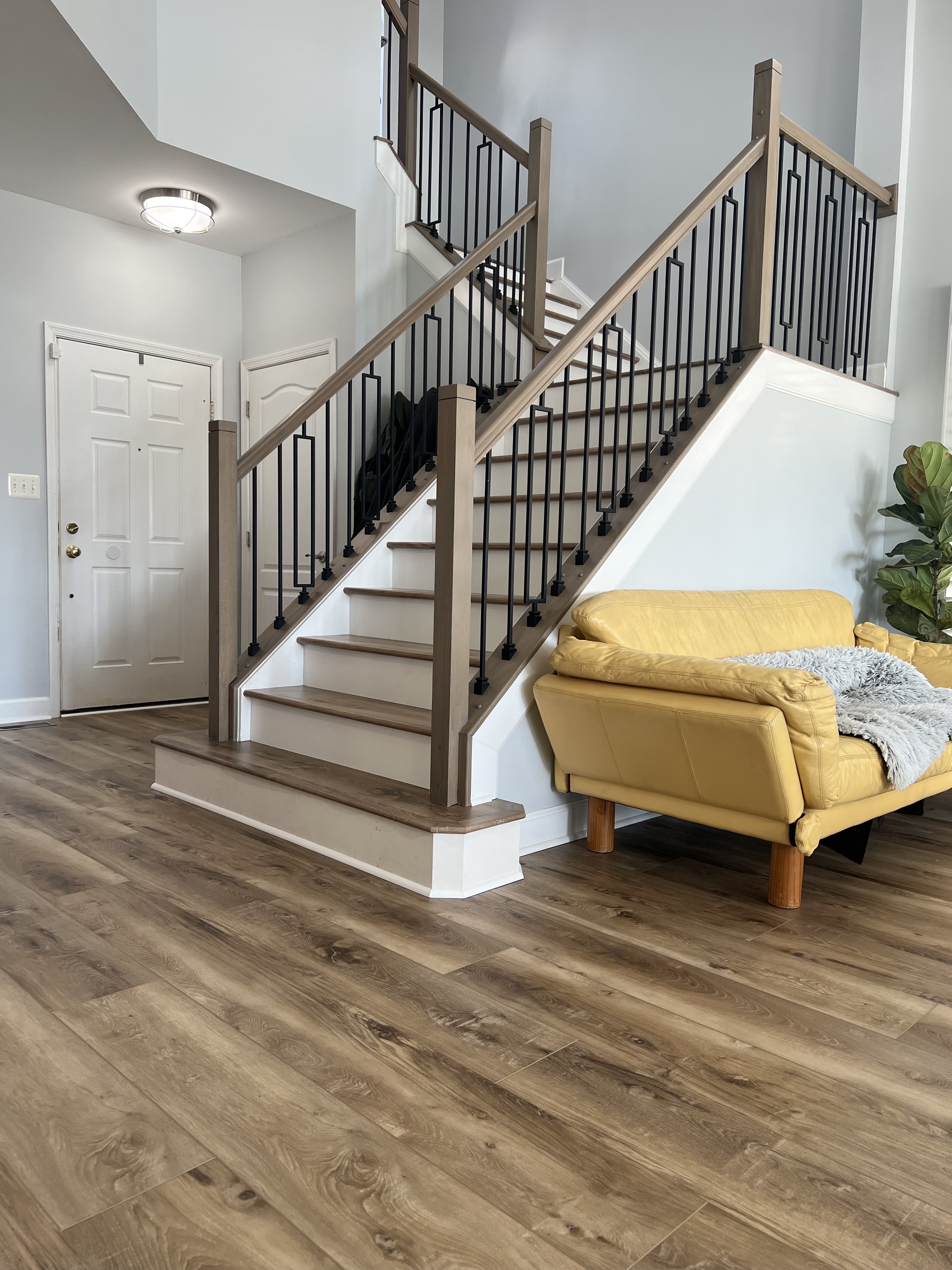 Modern staircase in foyer.